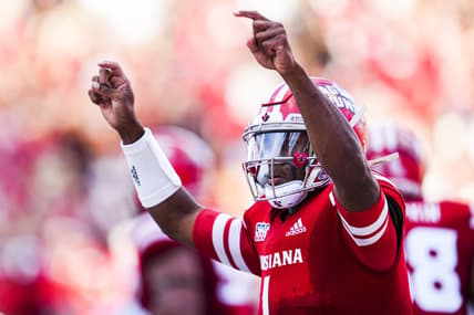 Dec 4, 2021; Lafayette, LA, USA; Louisiana Ragin Cajuns quarterback Levi Lewis (1) celebrates after scoring a touchdown during the second quarter against the Appalachian State Mountaineers during the Sun Belt Conference championship game. Mandatory Credit: Andrew Wevers-USA TODAY Sports