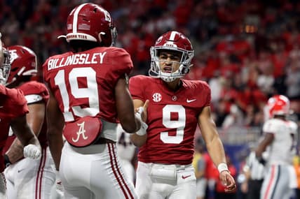 Dec 4, 2021; Atlanta, GA, USA; Alabama Crimson Tide quarterback Bryce Young (9) celebrates his rushing touchdown with tight end Jahleel Billingsley (19) during the second quarter against the Georgia Bulldogs in the SEC championship game at Mercedes-Benz Stadium. Mandatory Credit: Jason Getz-USA TODAY Sports