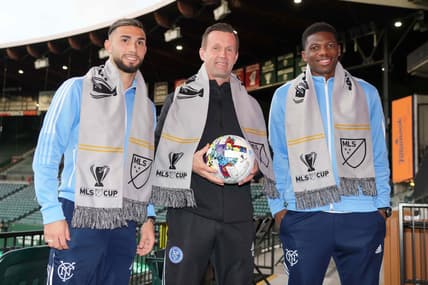 Dec 9, 2021; Portland, OR, USA; New York City FC forward Valentin Castellanos (Taty Castellanos), left, head coach Rony Della (center) and Sean Johnson pose during a press conference at Providence Park. Mandatory Credit: Kirby Lee-USA TODAY Sports