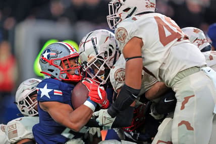 Dec 11, 2021; East Rutherford, New Jersey, USA; Navy Midshipmen running back Maquel Haywood (24) gets stuffed on a carry against the Army Black Knights during the second quarter of the 122nd Army-Navy game. Mandatory Credit: Danny Wild-USA TODAY Sports