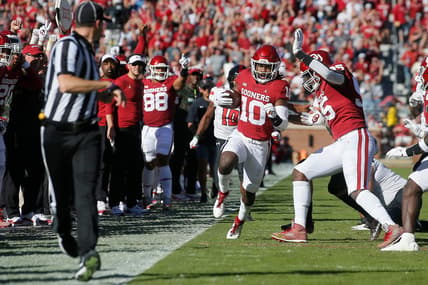 OU safety Pat Fields (10) returns an interception against Texas Tech on Oct. 30 in Norman.

cover