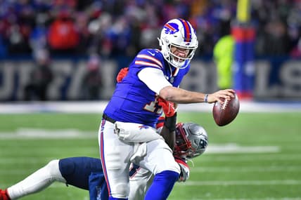 Dec 6, 2021; Orchard Park, New York, USA; Buffalo Bills quarterback Josh Allen (17) and New England Patriots outside linebacker Matt Judon (9) in the third quarter at Highmark Stadium. Mandatory Credit: Mark Konezny-USA TODAY Sports