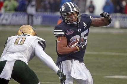 Dec 18, 2021; Shreveport, LA, USA; BYU Cougars running back Tyler Allgeier (25) runs after the catch during the first quarter against the UAB Blazers during the 2021 Independence Bowl at Independence Stadium. Mandatory Credit: Petre Thomas-USA TODAY Sports