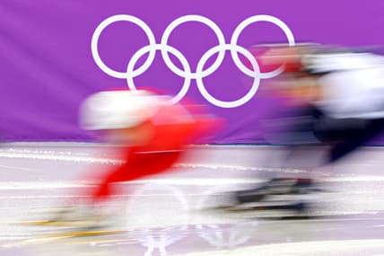 Feb 10, 2018; Pyeongchang, South Korea; Skaters goes past the Olympics Rings in the men's short track 1,500m heats during the Pyeongchang 2018 Olympic Winter Games. Mandatory Credit: Geoff Burke-USA TODAY Sports