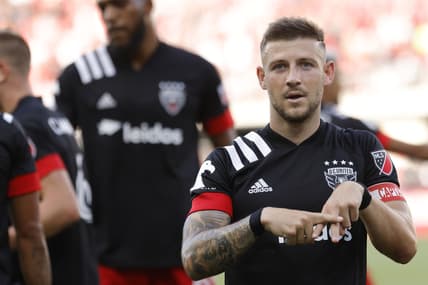 Jul 3, 2021; Washington, DC, USA; D.C. United forward Paul Arriola (7) celebrates after scoring a goal against Toronto FC in the second half at Audi Field. Mandatory Credit: Geoff Burke-USA TODAY Sports