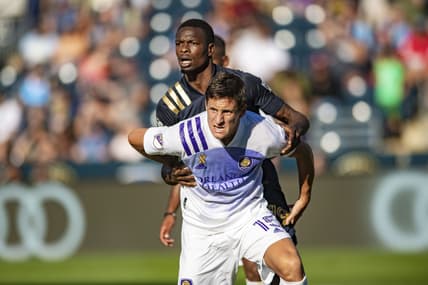 Sep 19, 2021; Philadelphia, Pennsylvania, USA; Orlando City defender Rodrigo Schlegel (15) fights for position in the box against the Philadelphia Union during the first half at Talen Energy Stadium. Mandatory Credit: John Jones-USA TODAY Sports