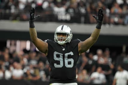 Sep 26, 2021; Paradise, Nevada, USA; Las Vegas Raiders defensive tackle Darius Philon (96) celebrates in the second half against the Miami Dolphinsat Allegiant Stadium.The Raiders defeated the Dolphins 31-28 in overtime. Mandatory Credit: Kirby Lee-USA TODAY Sports
