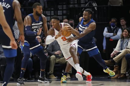 Dec 28, 2021; Minneapolis, Minnesota, USA; New York Knicks forward R.J. Barrett (9) pulls away from the defense of Minnesota Timberwolves center Greg Monroe (55) and guard Jaylen Nowell (4) in the fourth quarter at Target Center. Mandatory Credit: Bruce Kluckhohn-USA TODAY Sports