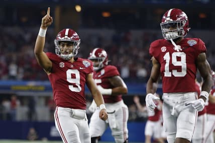Dec 31, 2021; Arlington, Texas, USA; Alabama Crimson Tide quarterback Bryce Young (9) reacts after throwing a touchdown in the fourth quarter against the Cincinnati Bearcats during the 2021 Cotton Bowl college football CFP national semifinal game at AT&T Stadium. Mandatory Credit: Tim Heitman-USA TODAY Sports