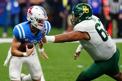 Jan 1, 2022; New Orleans, LA, USA; Baylor Bears defensive tackle Siaki Ika (62) reaches for Mississippi Rebels quarterback Luke Altmyer (7) during the first half in the 2022 Sugar Bowl at Caesars Superdome. Mandatory Credit: John David Mercer-USA TODAY Sports