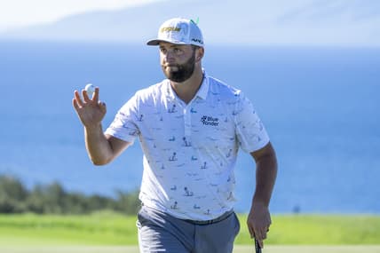 January 8, 2022; Maui, Hawaii, USA; Jon Rahm acknowledges the crowd after making his putt on the 10th hole during the third round of the Sentry Tournament of Champions golf tournament at Kapalua Resort - The Plantation Course. Mandatory Credit: Kyle Terada-USA TODAY Sports
