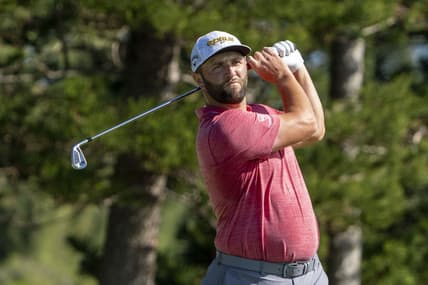 January 9, 2022; Maui, Hawaii, USA; Jon Rahm hits his tee shot on the second hole during the final round of the Sentry Tournament of Champions golf tournament at Kapalua Resort - The Plantation Course. Mandatory Credit: Kyle Terada-USA TODAY Sports