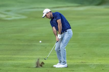 January 14, 2022; Honolulu, Hawaii, USA; Russell Henley hits his chip shot on the 10th hole during the second round of the Sony Open in Hawaii golf tournament at Waialae Country Club. Mandatory Credit: Kyle Terada-USA TODAY Sports