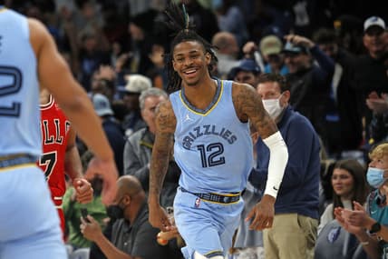 Jan 17, 2022; Memphis, Tennessee, USA; Memphis Grizzles guard Ja Morant (12) reacts after a basket against the Chicago Bulls during the second half at FedExForum. Mandatory Credit: Petre Thomas-USA TODAY Sports