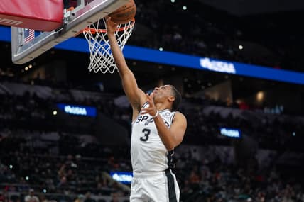 Jan 17, 2022; San Antonio, Texas, USA;  San Antonio Spurs forward Keldon Johnson (3) shoots in the second half against the Phoenix Suns at the AT&T Center. Mandatory Credit: Daniel Dunn-USA TODAY Sports