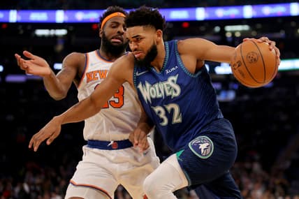 Jan 18, 2022; New York, New York, USA; Minnesota Timberwolves center Karl-Anthony Towns (32) drives to the basket against New York Knicks center Mitchell Robinson (23) during the first quarter at Madison Square Garden. Mandatory Credit: Brad Penner-USA TODAY Sports