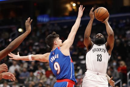 Jan 19, 2022; Washington, District of Columbia, USA; Brooklyn Nets guard James Harden (13) shoots the ball over Washington Wizards forward Deni Avdija (9) during the first quarter at Capital One Arena. Mandatory Credit: Geoff Burke-USA TODAY Sports