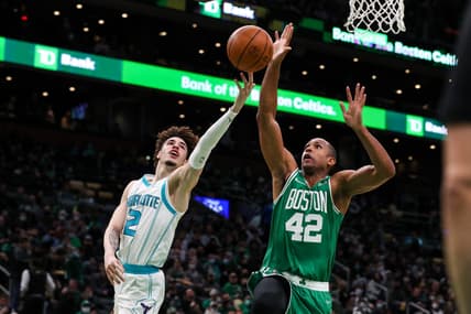 Jan 19, 2022; Boston, Massachusetts, USA; Charlotte Hornets guard LaMelo Ball (2) shoots defended by Boston Celtics forward Al Horford (42) during the first half at TD Garden. Mandatory Credit: Paul Rutherford-USA TODAY Sports