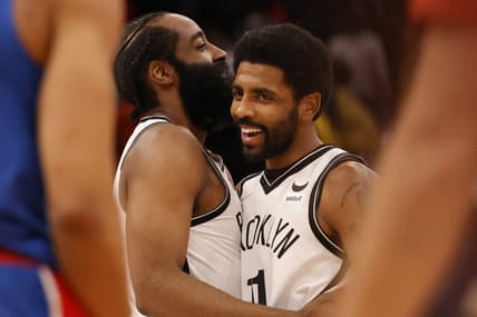 Jan 19, 2022; Washington, District of Columbia, USA; Brooklyn Nets guard James Harden (13) celebrates with Brooklyn Nets guard Kyrie Irving (11) after their game against the Washington Wizards at Capital One Arena. Mandatory Credit: Geoff Burke-USA TODAY Sports