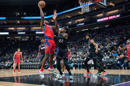 Jan 19, 2022; Sacramento, California, USA;  Detroit Pistons center Isaiah Stewart (28) shoots over Sacramento Kings center Richaun Holmes (22) during the first quarterat Golden 1 Center. Mandatory Credit: Neville E. Guard-USA TODAY Sports