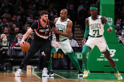 Jan 21, 2022; Boston, Massachusetts, USA; Boston Celtics forward Al Horford (42) defends Portland Trail Blazers center Jusuf Nurkic (27) during the second half at TD Garden. Mandatory Credit: Paul Rutherford-USA TODAY Sports