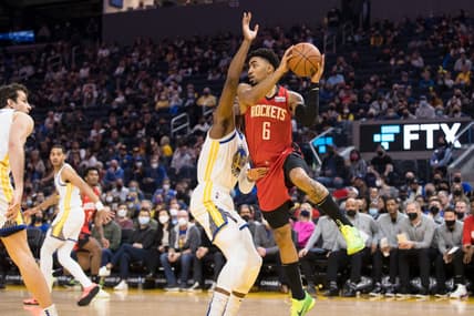 Jan 21, 2022; San Francisco, California, USA; Houston Rockets forward KJ Martin (6) looks to pass over Golden State Warriors forward Jonathan Kuminga (00) during the first half at Chase Center. Mandatory Credit: John Hefti-USA TODAY Sports