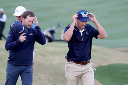 Lee Hodges, left, and Paul Barjon finish on the 9th green of the Pete Dye Stadium Course at PGA West during round three of The American Express in La Quinta, Calif., on Saturday, Jan. 22, 2022.

Barjon And Hodges American Express Round Three3531