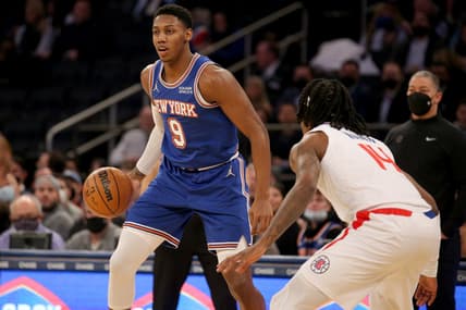 Jan 23, 2022; New York, New York, USA; New York Knicks guard RJ Barrett (9) controls the ball against Los Angeles Clippers guard Terance Mann (14) during the first quarter at Madison Square Garden. Mandatory Credit: Brad Penner-USA TODAY Sports