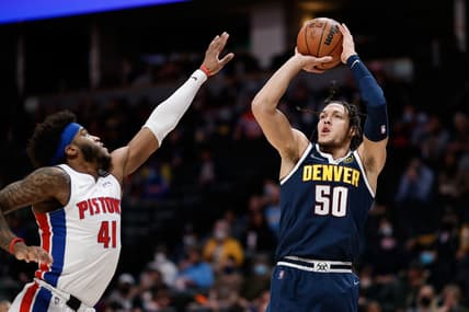 Jan 23, 2022; Denver, Colorado, USA; Denver Nuggets forward Aaron Gordon (50) attempts a shot as Detroit Pistons forward Saddiq Bey (41) defends in the first quarter at Ball Arena. Mandatory Credit: Isaiah J. Downing-USA TODAY Sports