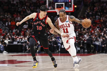 Jan 26, 2022; Chicago, Illinois, USA; Chicago Bulls forward DeMar DeRozan (11) drives to the basket against Toronto Raptors forward Yuta Watanabe (18) during the first half at United Center. Mandatory Credit: Kamil Krzaczynski-USA TODAY Sports