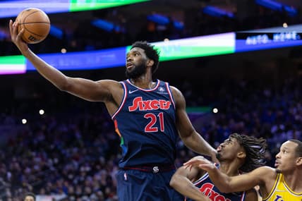 Jan 27, 2022; Philadelphia, Pennsylvania, USA; Philadelphia 76ers center Joel Embiid (21) reaches for a rebound against the Los Angeles Lakers during the second quarter at Wells Fargo Center. Mandatory Credit: Bill Streicher-USA TODAY Sports