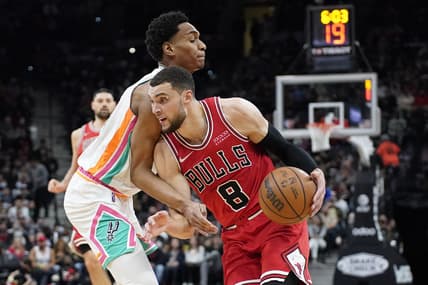 Jan 28, 2022; San Antonio, Texas, USA; Chicago Bulls guard Zach LaVine (8) drives to the basket while defended by San Antonio Spurs guard Devin Vassell (24) during the first half  at AT&T Center. Mandatory Credit: Scott Wachter-USA TODAY Sports