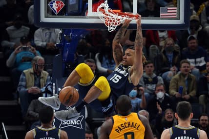 Jan 28, 2022; Memphis, Tennessee, USA; Memphis Grizzles forward Brandon Clarke (15) dunks during the second half against the Utah Jazz at FedExForum. Mandatory Credit: Petre Thomas-USA TODAY Sports