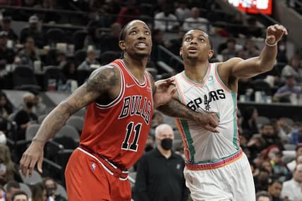 Jan 28, 2022; San Antonio, Texas, USA; Chicago Bulls guard DeMar DeRozan (11) and San Antonio Spurs forward Keldon Johnson (3) battle for position during the second half at AT&T Center. Mandatory Credit: Scott Wachter-USA TODAY Sports