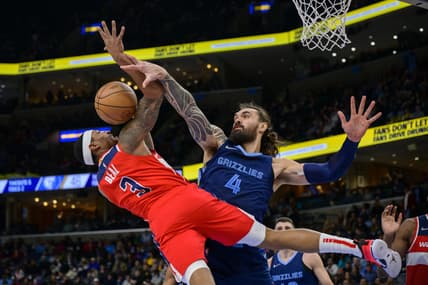 Jan 29, 2022; Memphis, Tennessee, USA; Memphis Grizzlies center Steven Adams (4) blocks a shot by Washington Wizards guard Bradley Beal (3) during the second quarter at the FedExForum. Mandatory Credit: Jerome Miron-USA TODAY Sports