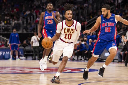 Jan 30, 2022; Detroit, Michigan, USA; Cleveland Cavaliers guard Darius Garland (10) drives to the basket against Detroit Pistons guard Cory Joseph (18) during the second quarter at Little Caesars Arena. Mandatory Credit: Raj Mehta-USA TODAY Sports