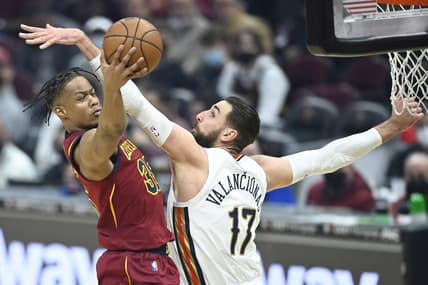 Jan 31, 2022; Cleveland, Ohio, USA; New Orleans Pelicans center Jonas Valanciunas (17) defends Cleveland Cavaliers forward Isaac Okoro (35) in the first quarter at Rocket Mortgage FieldHouse. Mandatory Credit: David Richard-USA TODAY Sports
