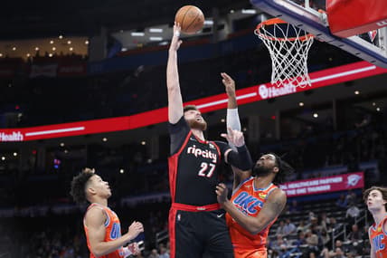 Jan 31, 2022; Oklahoma City, Oklahoma, USA; Portland Trail Blazers center Jusuf Nurkic (27) goes up for a basket as Oklahoma City Thunder center Derrick Favors (15) defends the shot during the first quarter at Paycom Center. Mandatory Credit: Alonzo Adams-USA TODAY Sports