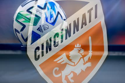 Aug 21, 2020; Cincinnati, OH, USA; (editors note: multiple exposure in camera used for this photo) A view of an official Adidas MLS game ball and the Cincinnati logo during the game between D.C. United and FC Cincinnati at Nippert Stadium. Mandatory Credit: Aaron Doster-USA TODAY Sports