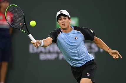 Oct 9, 2021; Indian Wells, CA, USA;  Mackenzie McDonald (USA) hits a shot during his second round match against Daniil Medvedev (RUS) in the BNP Paribas Open at the Indian Wells Tennis Garden. Mandatory Credit: Jayne Kamin-Oncea-USA TODAY Sports