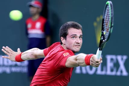 Pedro Martinez of Spain returns a shot to Stefanos Tsitsipas of Greece during the BNP Paribas Open in Indian Wells, Calif., on October 10, 2021.

Stefanos Tsitsipas Vs Pedro Martinez Bnp Paribas2062