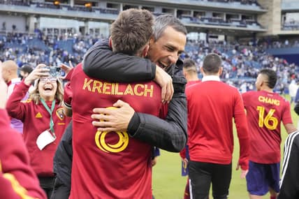 Nov 28, 2021; Kansas City, MO, USA; Real Salt Lake midfielder Damir Kreilach (8) and manager Pablo Mastroeni (center, right) celebrate after defeating the Sporting Kansas City in the conference semifinals of the 2021 MLS playoffs at Children's Mercy Park. Mandatory Credit: Jay Biggerstaff-USA TODAY Sports