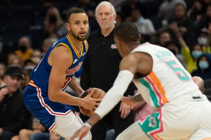 Dec 4, 2021; San Francisco, California, USA;  Golden State Warriors guard Stephen Curry (30) looks to shoot the ball during the third quarter against San Antonio Spurs guard Dejounte Murray (5) at Chase Center. Mandatory Credit: Stan Szeto-USA TODAY Sports