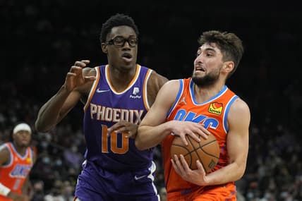 Dec 29, 2021; Phoenix, Arizona, USA; Oklahoma City Thunder guard Ty Jerome (16) drives to the basket against Phoenix Suns forward Jalen Smith (10) in the second half at Footprint Center. Mandatory Credit: Rick Scuteri-USA TODAY Sports