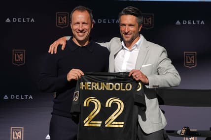 Jan 5, 2022; LA, CA, USA; Steve Cherundolo (left) poses with general manager John Thorington at press conference to announce Cherundolo's hiring as LAFC head coach at Banc of California Stadium. Mandatory Credit: Kirby Lee-USA TODAY Sports