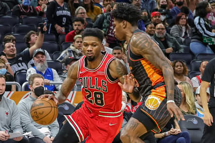Jan 23, 2022; Orlando, Florida, USA; Chicago Bulls forward Alfonzo McKinnie (28) drives to the basket against Orlando Magic forward Admiral Schofield (25) during the second half at Amway Center. Mandatory Credit: Mike Watters-USA TODAY Sports