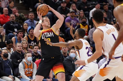 Jan 26, 2022; Salt Lake City, Utah, USA;  Utah Jazz guard Joe Ingles (2) passes the ball away from Phoenix Suns forward Mikal Bridges (25) during the first quarter at Vivint Arena. Mandatory Credit: Chris Nicoll-USA TODAY Sports