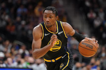 Feb 1, 2022; San Antonio, Texas, USA;  Golden State Warriors forward Jonathan Kuminga (00) dribbles in the second half against the San Antonio Spurs at the AT&T Center. Mandatory Credit: Daniel Dunn-USA TODAY Sports