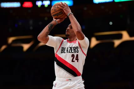 Feb 2, 2022; Los Angeles, California, USA; Portland Trail Blazers forward Norman Powell (24) shoots against the Los Angeles Lakers during the first half at Crypto.com Arena. Mandatory Credit: Gary A. Vasquez-USA TODAY Sports