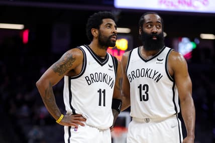Feb 2, 2022; Sacramento, California, USA; Brooklyn Nets guard Kyrie Irving (11) and guard James Harden (13) talk during the fourth quarter against the Sacramento Kings at Golden 1 Center. Mandatory Credit: Sergio Estrada-USA TODAY Sports